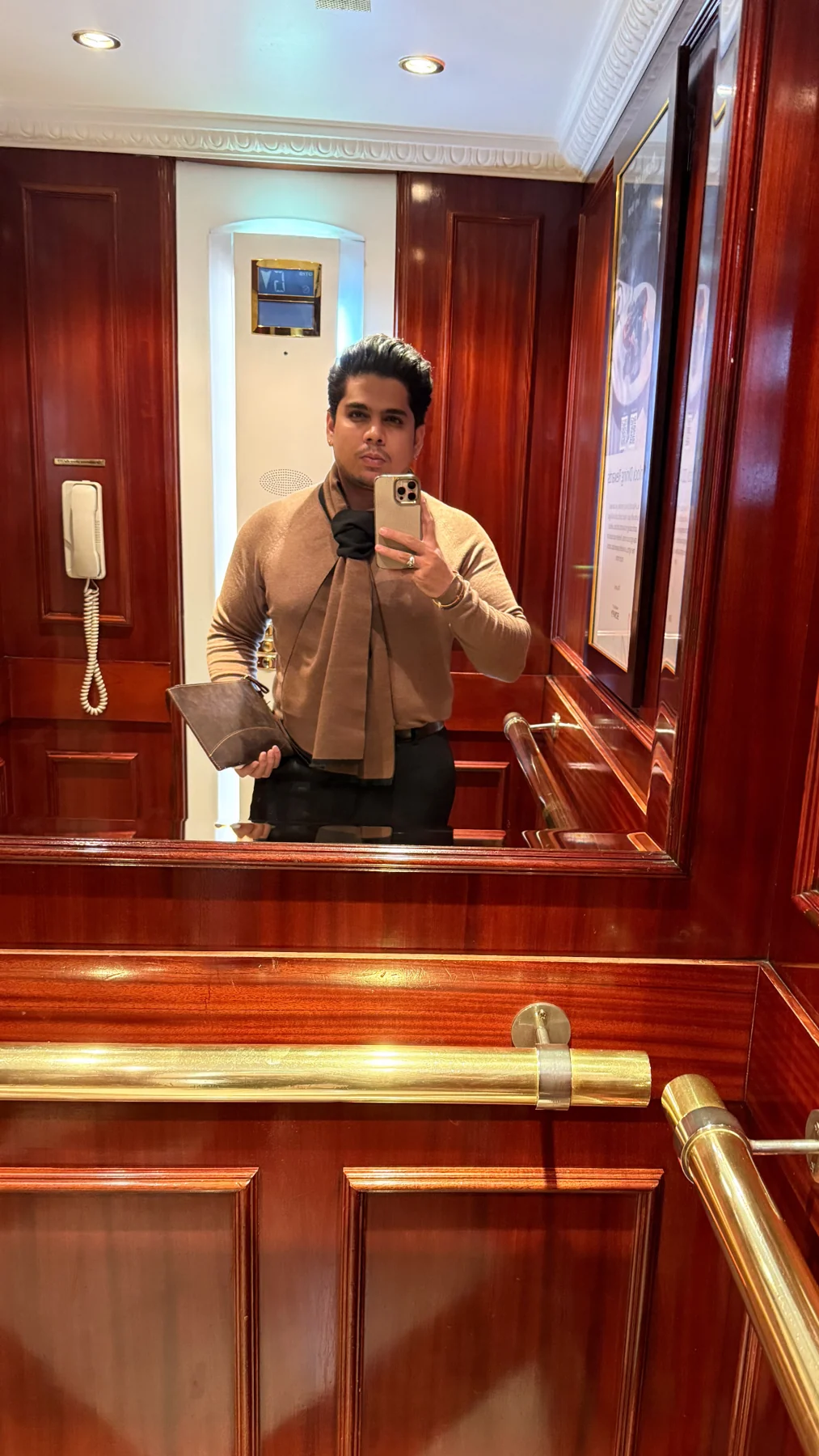 Muhammad Laraib Khan in a check suit portrait